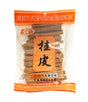 Packaged cinnamon sticks labeled Merilin International Trading Inc, with Chinese characters, in a clear plastic packaging.