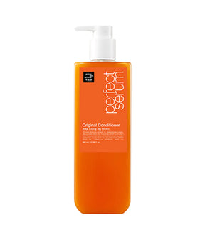 Orange bottle of 'Perfect Serum' conditioner with pump on a white background