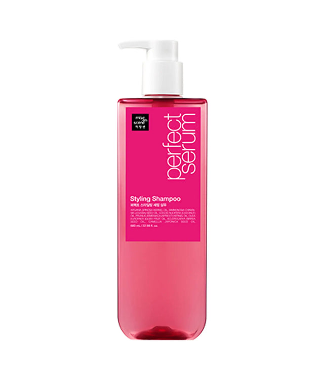 Pink shampoo bottle with pump labeled 'Perfect Serum' on a white background