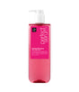 Pink shampoo bottle with pump labeled 'Perfect Serum' on a white background
