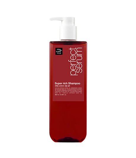 Red shampoo bottle with pump labeled 'Perfect Serum' on a white background