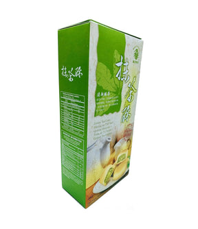 Packaging of Mong Lee Shang Green Tea Cake showing the product name, weight, and images of the green tea cake.