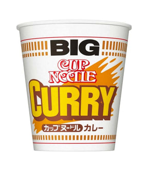 Packaging of Nissin Big Cup Noodle in Curry flavor, predominantly white with red and yellow accents and text.