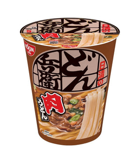 A cup of Japanese instant noodles from the brand Kusan, featuring a brown paper cup with a printed lid. The packaging displays Japanese text and an appetizing image of beef and noodles with green onions.