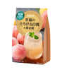 A bag of Japanese peach melty tea featuring white and gold peaches, with a graphic of a peach drink in a glass on the front, set against a plain white background.