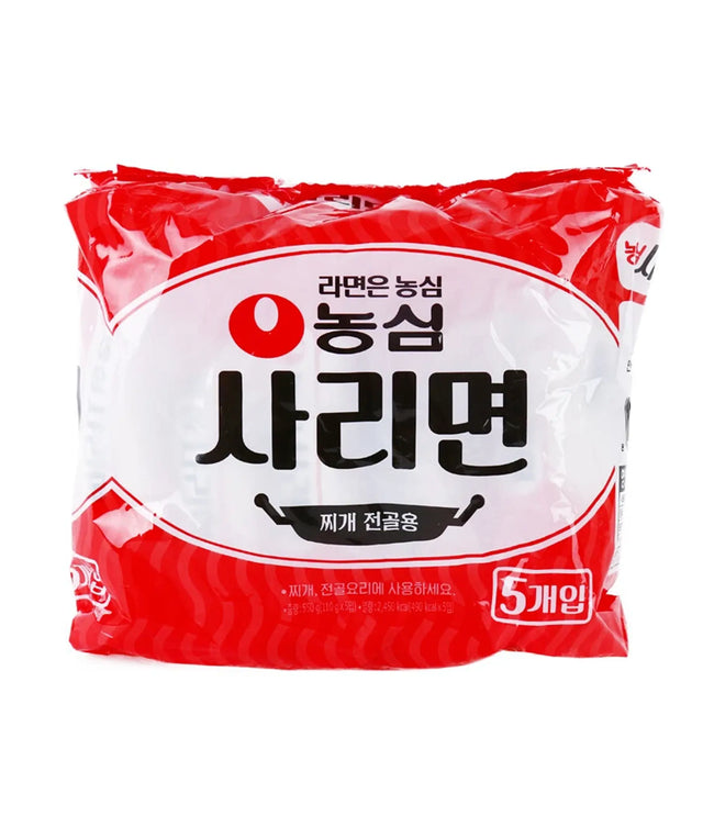 Red and white package of Nong Shim Sarimyeon with Korean text on a white background