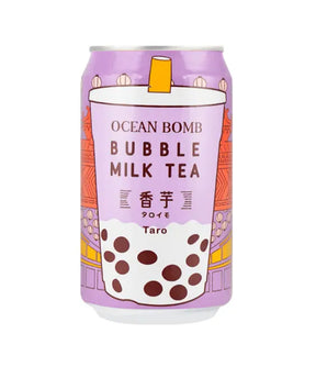 A can of Ocean Bomb Bubble Milk Tea with Taro flavor, showcasing the drink and its bubble toppings against a purple background.