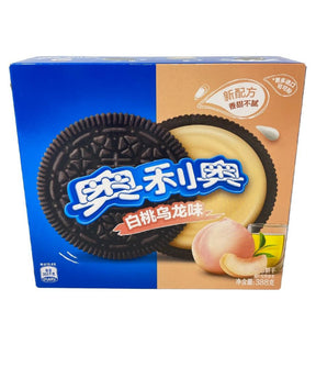 A package of Oreo biscuits featuring peach and oolong flavors, with images of the biscuits and tea leaves on the front.