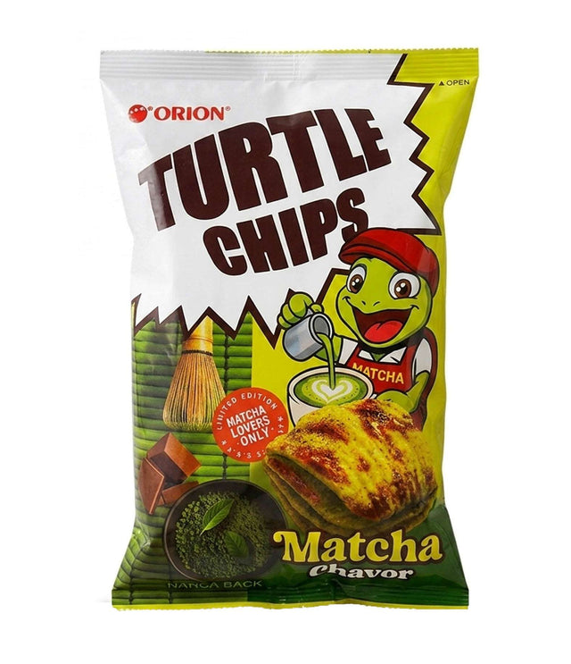 A bag of Orion Turtle Chips Matcha flavor chips, featuring a white and yellow packaging design with a cartoon turtle character and illustrations of matcha green tea and a tortilla chip.