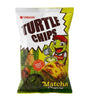 A bag of Orion Turtle Chips Matcha flavor chips, featuring a white and yellow packaging design with a cartoon turtle character and illustrations of matcha green tea and a tortilla chip.