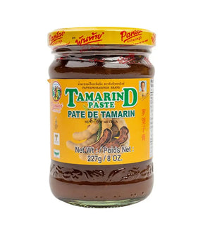 A jar of Pantai Tamarind Paste 227g with product information and branding visible on the label.