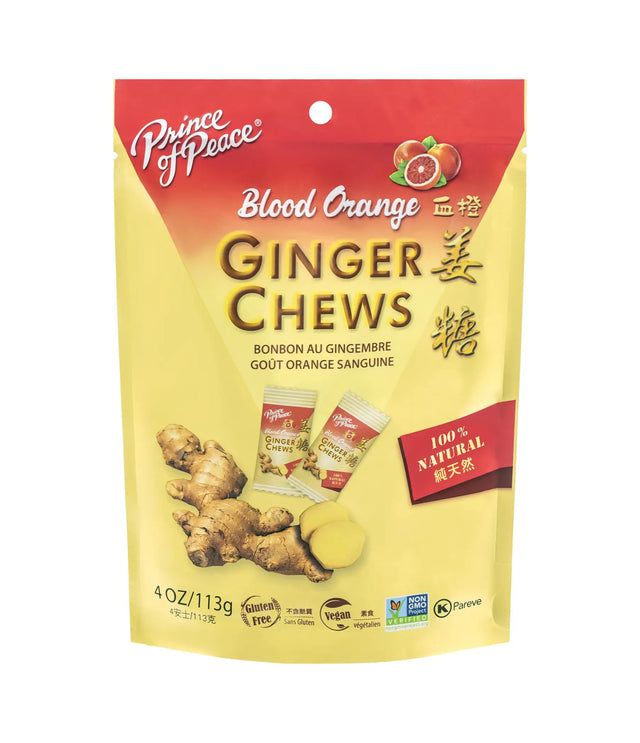 A 4 oz stand-up pouch of Prince of Peace Blood Orange Ginger Chews, featuring a red and pale yellow design with illustrations of ginger root and a small pack of the chews.