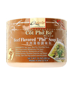 A packaged product labeled as 'Côt Pho Bo' Beef Flavored Pho Soup Base, with product information and branding visible.