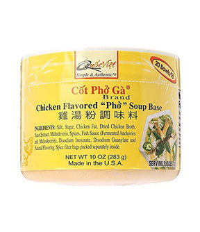 A packaged product labeled 'Quoc Viet Chicken Flavoured Pho Soup Base' with an image of the soup and a chicken on the packaging, indicating it is made in the U.S.