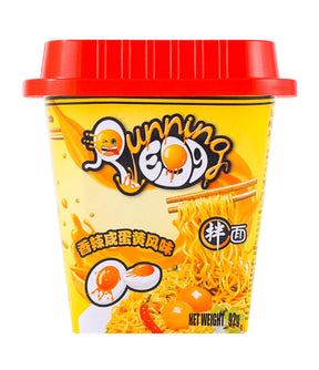 Cup of noodles with a red lid and yellow packaging featuring a cartoon character.