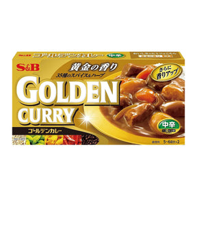 Packaging of S&B Golden Curry Sauce Mix featuring the product name, an image of the curry sauce on vegetables, and various Japanese characters.