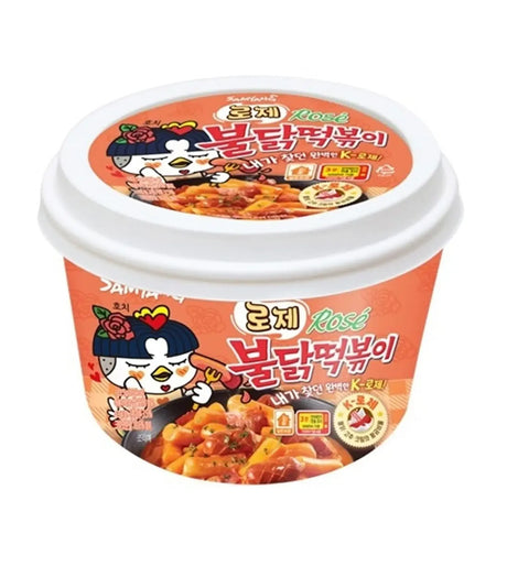 A packaged product of Samyang Buldak Topokki (Rosé) 183.5g, featuring an illustration of a character on the cup noodles packaging.