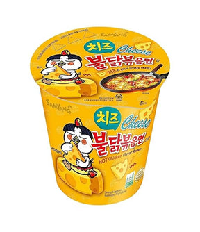 Packaging of Samyang Spicy Chicken Buldak Noodle (Cheese) showing the product name, halal certification, and an illustration of a character eating noodles.