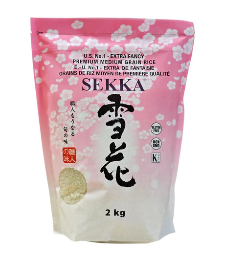 Pink packaging of SEKKA rice with cherry blossom design on a white background