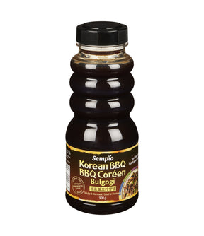A bottle of Sempio Korean BBQ Marinade (Bulgogi) with a white label on a plain background.