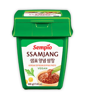 A container of Sempio Ssamjang Korean Soybean Dipping Paste, 500g size, with green lid and label indicating it is vegan.