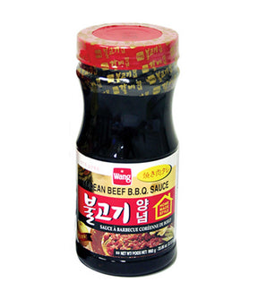 A bottle of Wang Korean B.B.Q. Sauce (Bulgogi) with a red cap on a white background.
