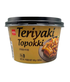 Container of Teriyaki Topokki with a black lid on a white background