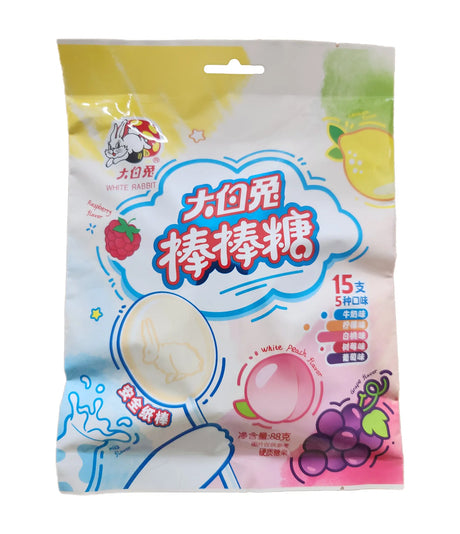 Packaging of White Rabbit lollipop candy with colorful design and text.