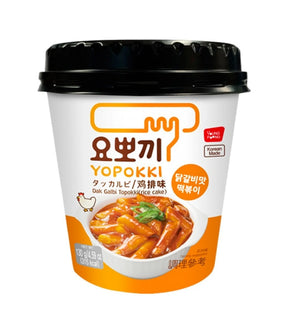 A cup of Young Poong Yopokki Dak Galbi Topokki, a Korean instant noodle product, with its packaging displayed.