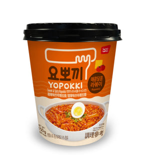 A cup of Young Poong Yopokki Sweet & Spicy Rapokki instant noodle showing the product name, an image of the noodles with egg, and nutritional information on the packaging.