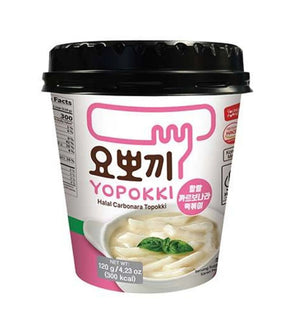 A cup of Yopokki Halal Carbonara Topoki, featuring a white and pink label with a black lid, on a plain white background.